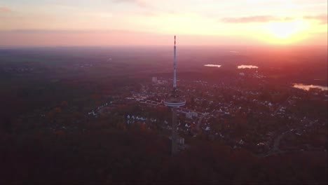 Kiel-Transmission-Tv-Tower-with-a-reddish-evening-sky,-Germany