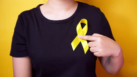 Suicide-prevention-day,-Sarcoma,-bone,-bladder-and-Childhood-cancer-Awareness-month,-Yellow-Ribbon-for-supporting-people-living-and-illness