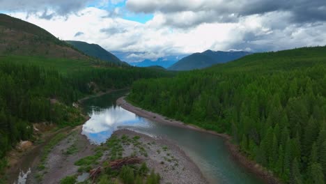 Flathead-River-Surrounded-By-Dense-Conifer-Forest-Near-Glacier-National-Park-In-Montana,-United-States