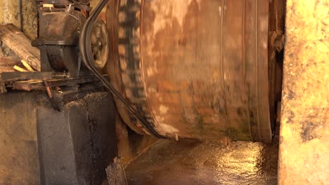 An-old-machine-in-the-tannery-in-Fez-used-to-wash-the-leather,-Morocco