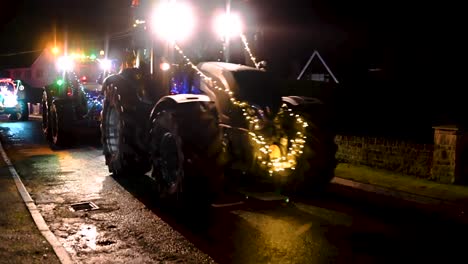 Large-selection-of-crew-within-the-Festive-Hope-Tractor-Run,-Horseman's-Green,-Whitchurch,-United-Kingdom