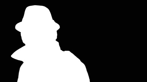 Mysterious-man-in-hat-looking-confused,-white-silhouette-on-black-background