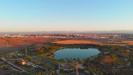 Alone-empty-park-aerial-view-at-sunset