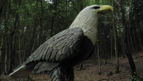A-Large-Model-Of-Eagle-In-Kashubian-Park-Of-Giants,-Strysza-Buda,-Poland---close-up