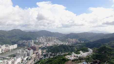 Aerial-view-of-Hong-Kong-Sha-Tin-mega-residential-buildings-with-Lion-Rock-mountains-in-the-background