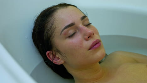 Young-woman-is-sleeping-in-the-bath