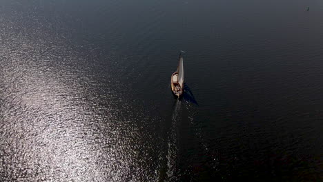 High-Aerial-of-traditional-sailboat-sailing-over-sea