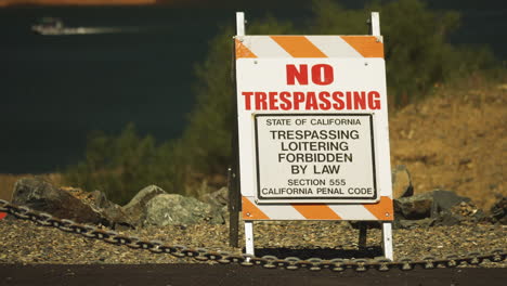 No-trespassing-sign-on-a-warm-sunny-day-near-Oroville-dam-in-California