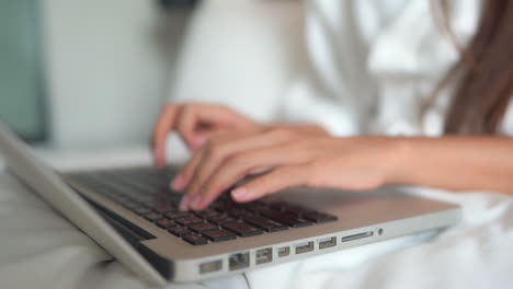 Close-up-of-female-hands-typing-on-laptop-keyboard