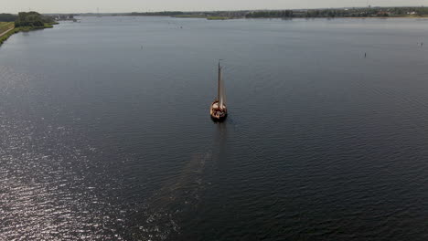 inspiring-Aerial-of-boat-slowly-sailing-over-sea
