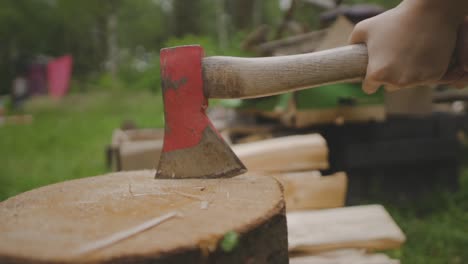 Chopping-wood-slow-motion.-Worker-chopping-wood-outdoors