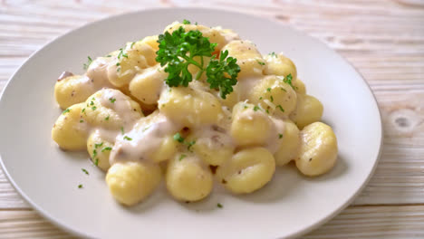Gnocchi-with-mushroom-cream-sauce-and-cheese---Italian-food-style