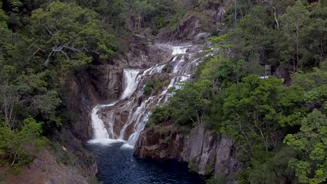 Slow-Aerial-Dolly-Over-Swimming-Hole-At-Clamshell-Falls-In-Cairns