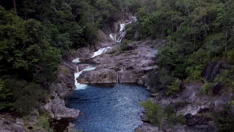 Aerial-Dolly-Back-Over-Swimming-Hole-At-Clamshell-Falls-In-Cairns