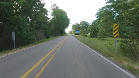 POV-driving-on-a-rural-highway-from-Alabama-into-Mississippi