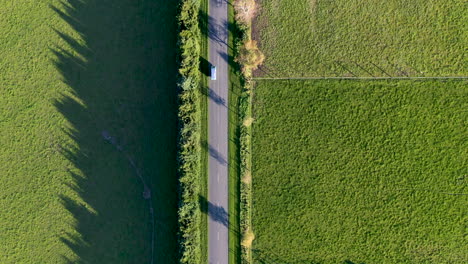 tracking-drone-shot-of-van-country-road