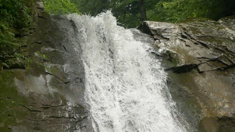 Slow-Motion-of-Water-Flow-Falling-from-the-Top-of-Pruncea-Waterfall,-Full-HD
