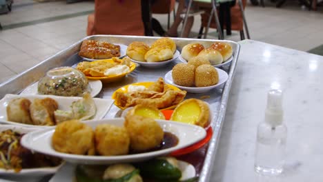 an-assortment-of-dim-sum-on-a-tray