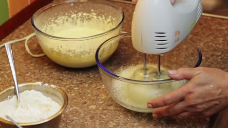 Beating-egg-whites-with-hand-mixer-for-spongecake-batter
