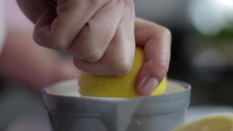 Squeezing-the-juice-out-of-a-lemon