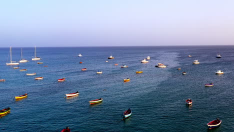 Aerial-shot-of-small-parked-fishing-boats-and-yachts