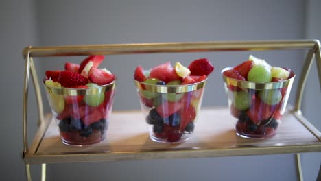 Delicious---Healthy-Fruit-Snack-Cups-on-Food-Display,-Dolly-Out