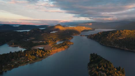 Beautiful-sunset-over-Patagonia-waterways,-aerial-dolly-view