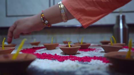 Hand-Of-An-Indian-Woman-Making-Candles