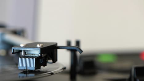 Turning-on-the-vinyl-record-player