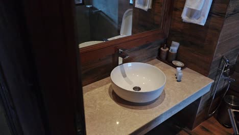 Elegant-Wash-Basin-Inside-The-Bathroom-Of-An-Luxurious-Hotel-Suite---zoom-out