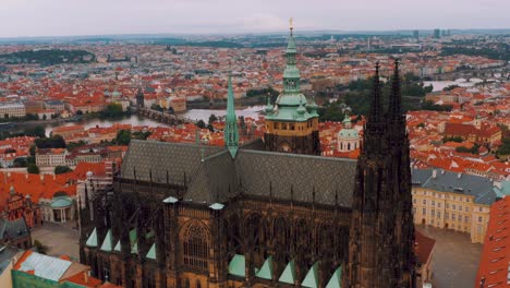 Aerial-view-above-Saints-Vitus-Cathedral-in-Prague-with-beautiful-cityscape,-day