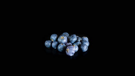 Timelapse-Of-Blueberries-Rotting-In-The-Studio-With-Black-Background---time-lapse
