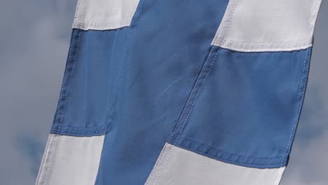 Flag-of-Finland-in-slow-motion-close-up,-ready-for-color-grading