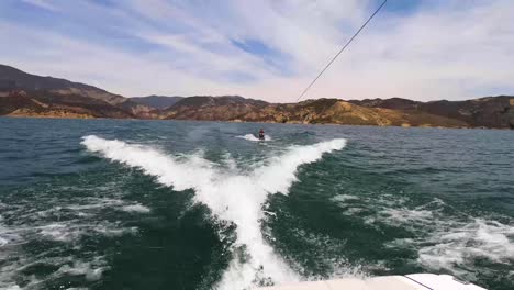 A-kid-knee-boarding-at-Castaic-Lake-in-California
