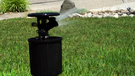 Close-up-take-of-a-hose-use-hide-away-sprinkler