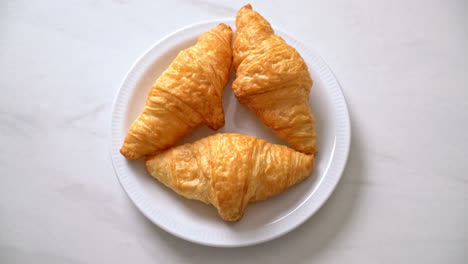 fresh-butter-croissant-on-plate