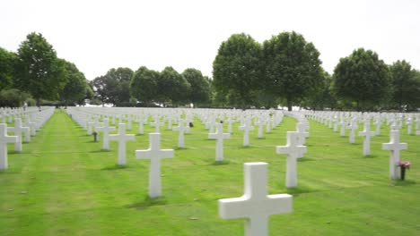 Wide-moving-shot-of-rows-of-white-crosses-at-the-Netherlands-American-Cemetery-and-Memorial-in-Margraten,-Holland