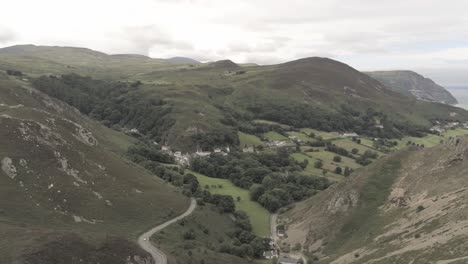 Capelulo-Penmaenmawr-Welsh-mountain-coastal-valley-aerial-view-north-wales-slow-track-right