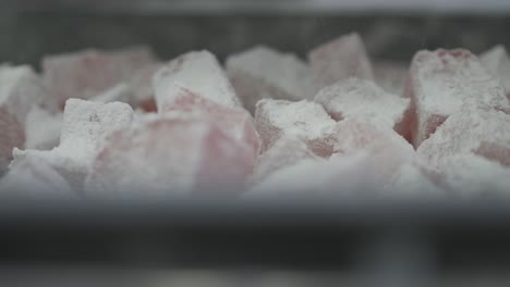 Close-up-of-individual-squares-of-sugared-Turkish-delight