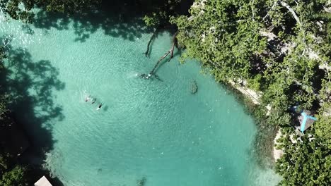 Birds-eye-view-of-people-swimming-and-enjoying-Blue-Lagoon-Vanuatu