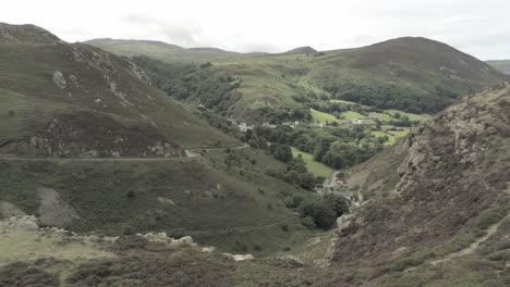 Capelulo-Penmaenmawr-Welsh-mountain-coastal-valley-aerial-descending-left-view-north-wales