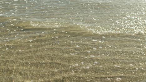Sea-ripple-texture-during-sunny-day.-Static