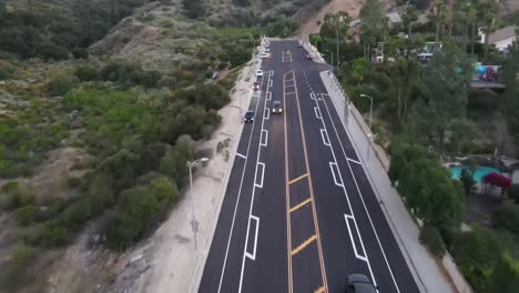Car-Driving-up-mountain-roads-aerial