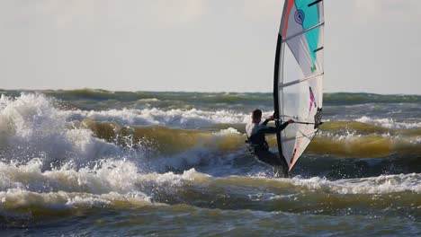 Male-Windsurfer-on-High-Ocean-Waves