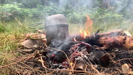 Cooking-on-campfire,-Highlands,-Scotland