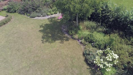 The-Stunning-Scenery-Of-Withered-Grass-Garden-On-A-Sunny-Day---Aerial-Shot