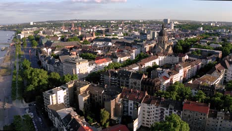 Aerial-shot-of-city-part-Neustadt-in-Mainz-showing-Christus-Kirche-and-Dom-and-its-old-bridge-in-the-back