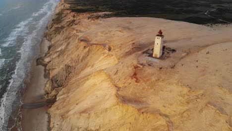 lighthouse-in-Rubjerg,-northern-Denmark.-4k-drone-footage