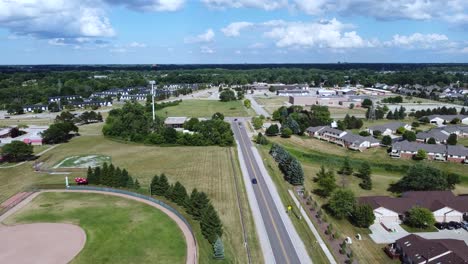 Drone-overlooks-a-lush-suburban-neighborhood-in-the-east-side-of-Michigan