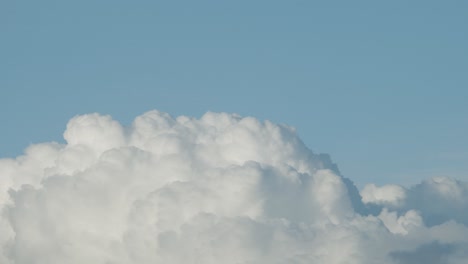 Huge-fluffy-rain-clouds-cumulus-stratocumulus-growing-time-lapse